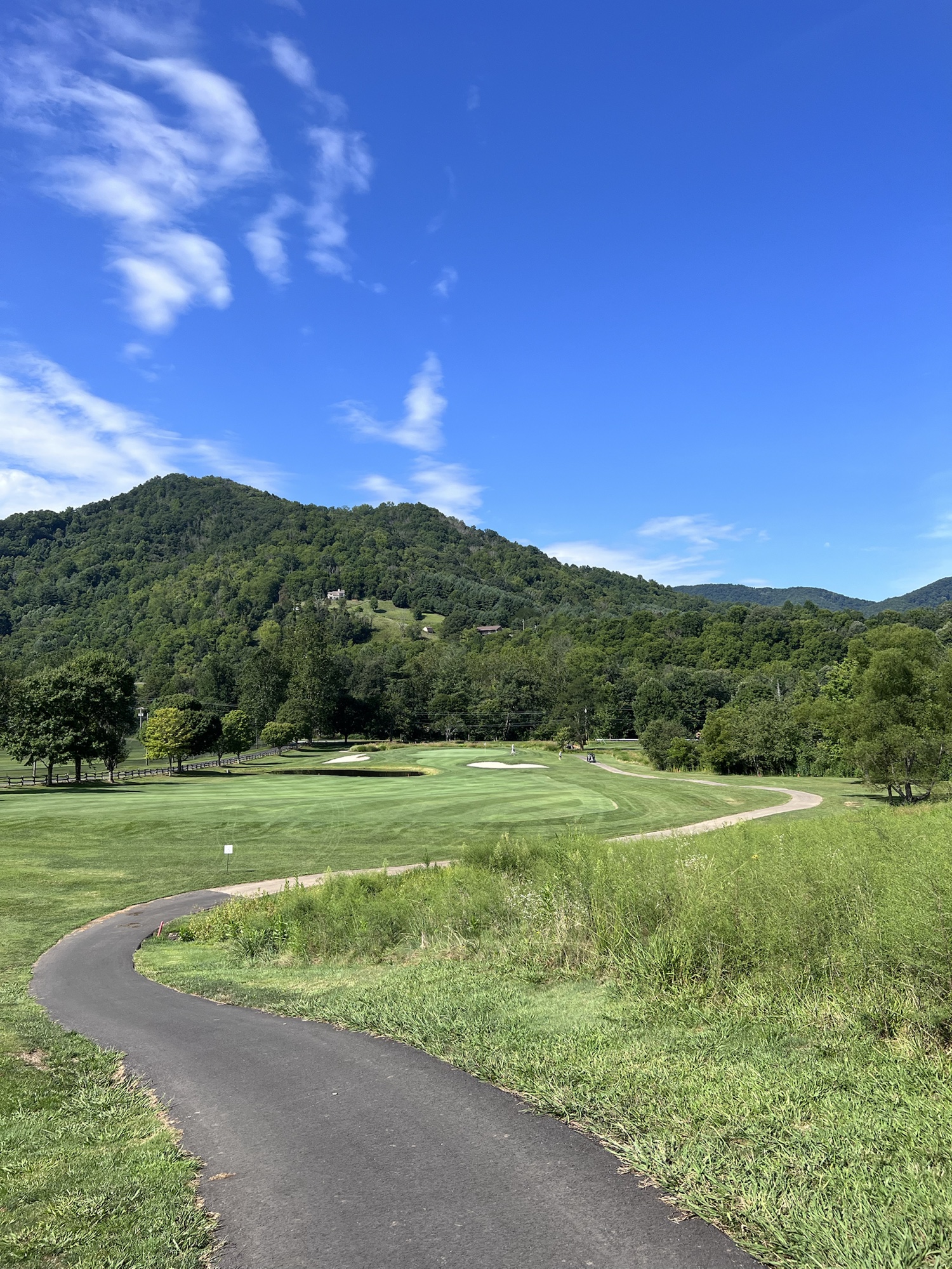 Springdale fairway with mountains and blue sky