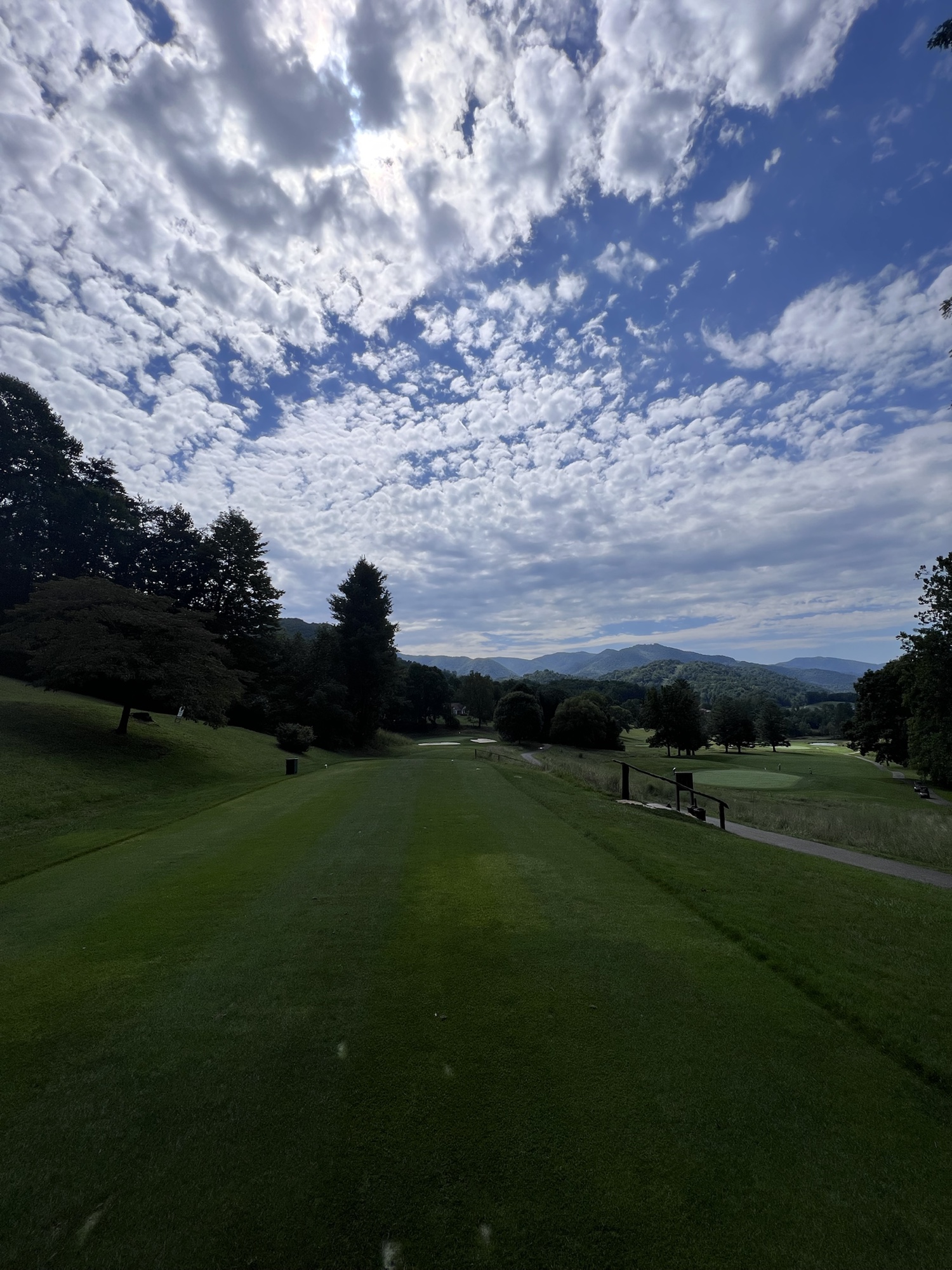 Dramatic cloud pattern above a Springdale tee