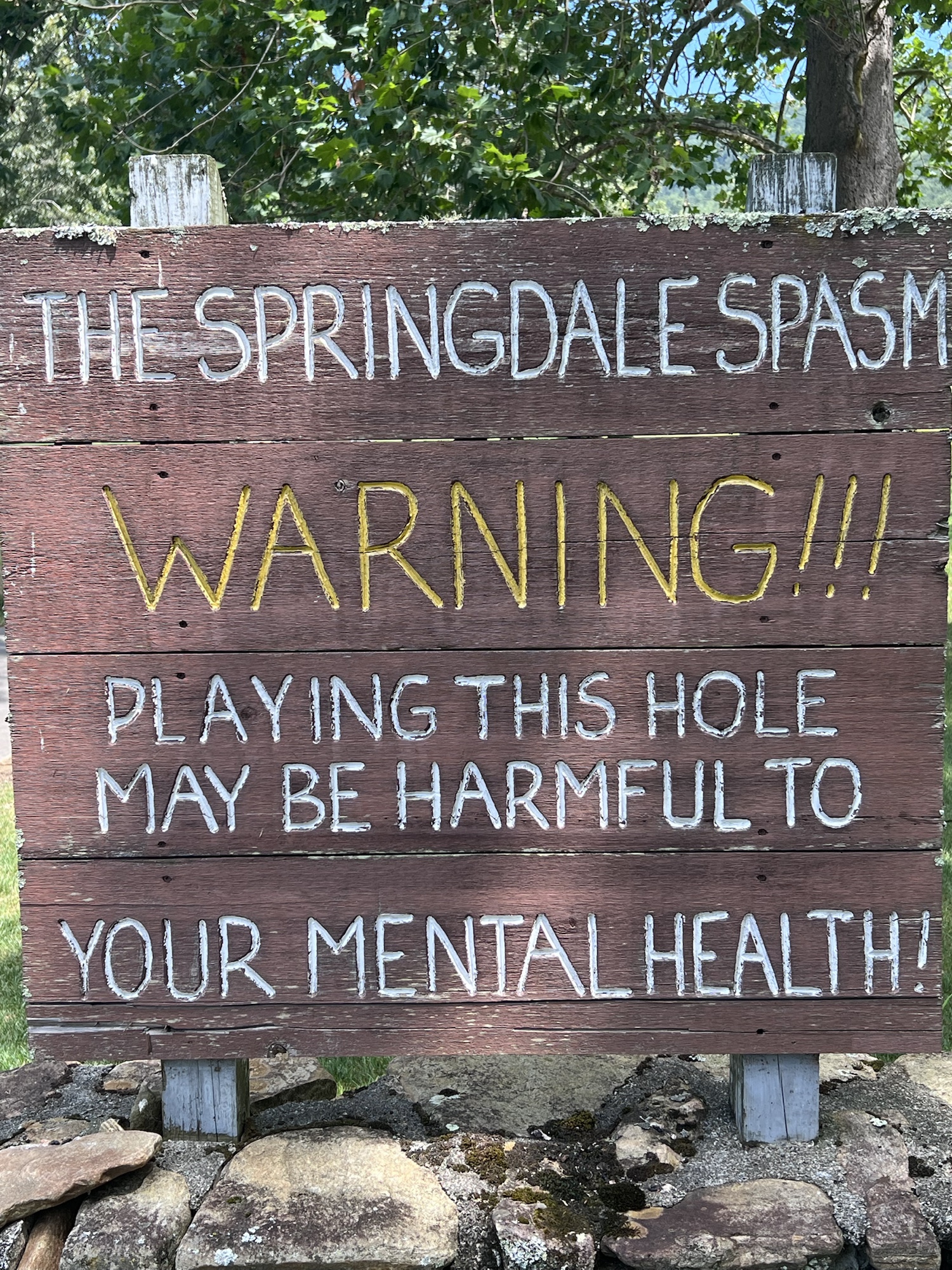 Close view of the Springdale Spasm warning sign
