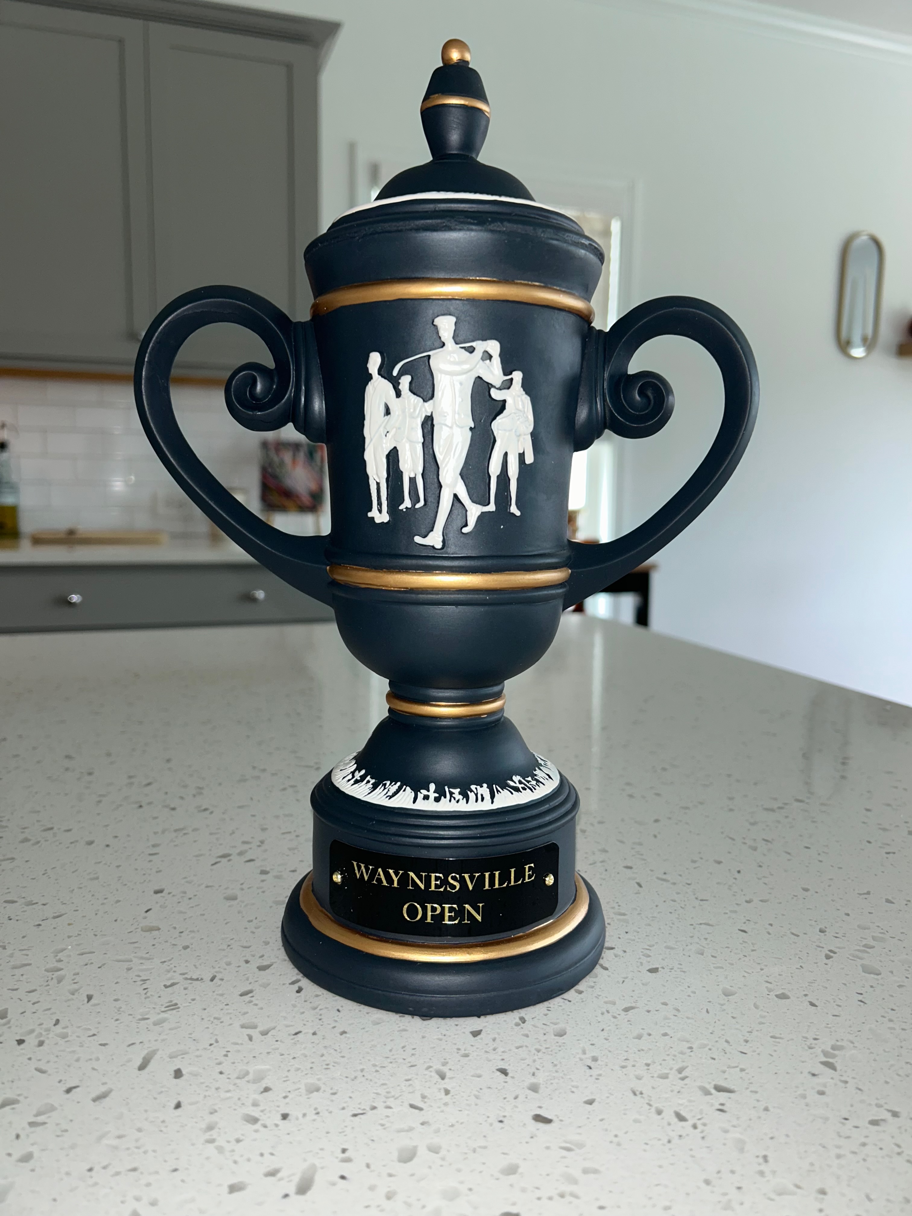 Black, white and gold two-handled Waynesville Open trophy